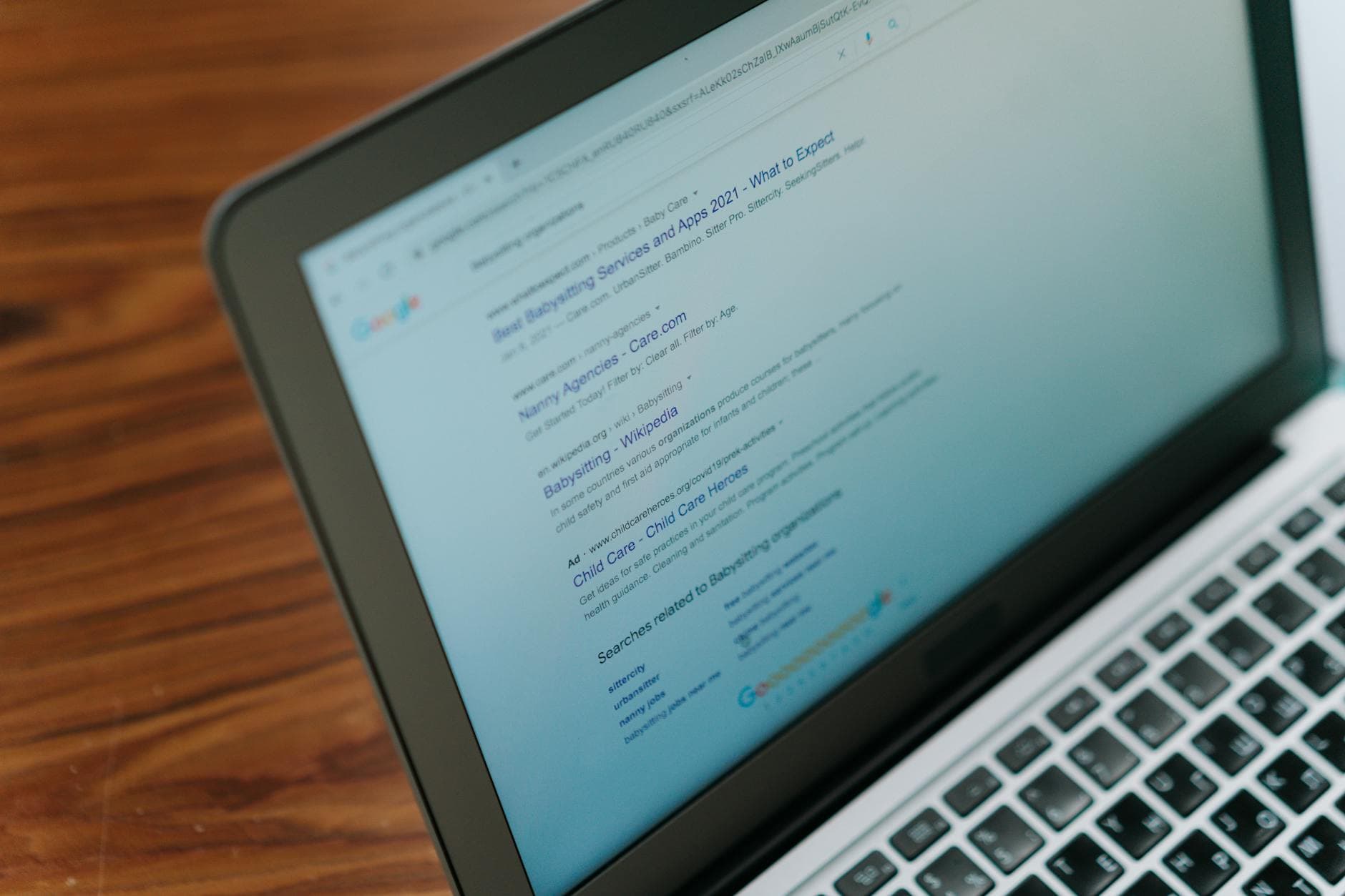 Google search results page showing AI Overview box with cited sources