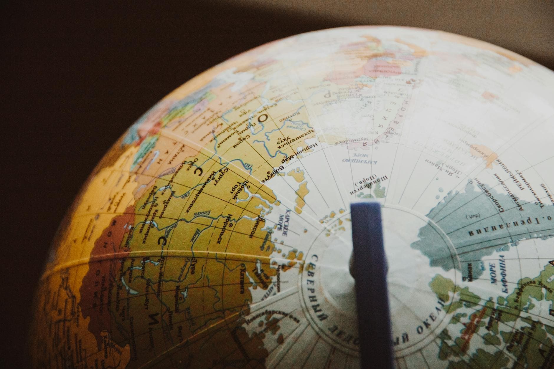 World map with search icon representing international SEO guide