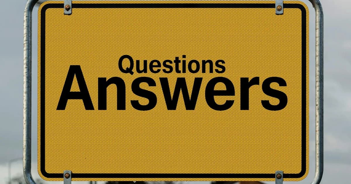 Yellow sign with text questions and answers suggesting direction in decision-making.